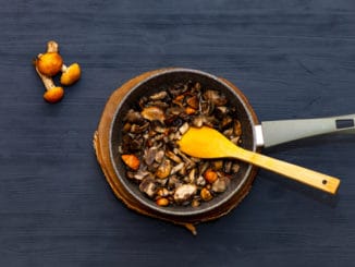 Cooking mushrooms in a pan. Fried mushrooms, boletus, orange-cap boletus.