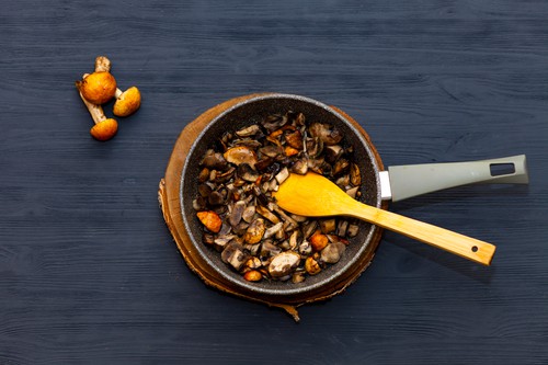 Cooking mushrooms in a pan. Fried mushrooms, boletus, orange-cap boletus.